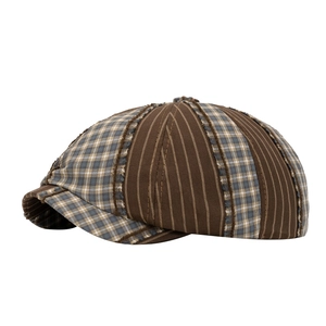 Retro patchwork newsboy cap with brown stripes and blue plaid fabric for a vintage style