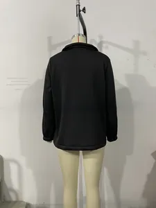 Back view of a casual black jacket featuring elastic cuffs and a premium textured fabric