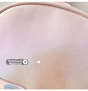 Detailed macro shot of premium pink PU leather texture and zipper on the mermaid backpack