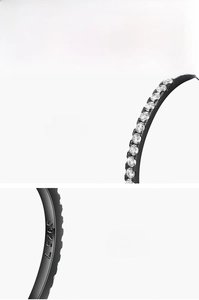 Close-up of S925 hallmark on a black gunmetal ring with prong-set 5A cubic zirconia