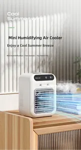 Mini white pet cooling fan with mist humidifier and digital touch screen on wood desk