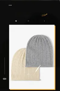 Detail of grey and beige ribbed knit wool beanies with textured diamond patterns