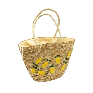 Large capacity straw beach bag with lemon embroidery and woven top handles in beige