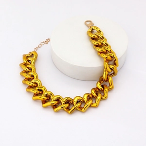 Detailed view of adjustable golden pet heart link chain necklace with lobster clasp