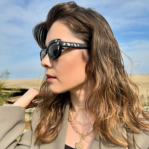Elegant square sunglasses with rhinestone details and gold layered necklace for women
