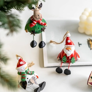 Christmas resin and iron tree ornaments featuring Santa Claus, elk, and snowman designs