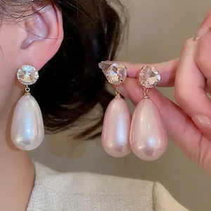 Elegant water drop pearl earrings with round zircon studs and a vintage French style finish