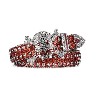 Sparkling red rhinestone hip hop belt with large silver skull buckle on white background