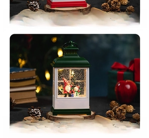 Detailed view of a vintage green Christmas lantern with gnome and snowman figures inside