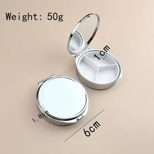 Portable 6cm round silver metal pill box with internal dividers and built-in mirror