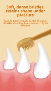 Close-up of the soft silicone bristles and rounded head on a pet toothbrush set