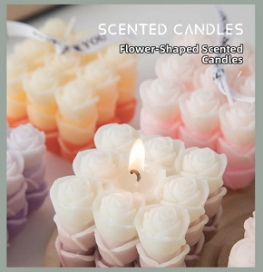 Detail of colorful flower shaped scented candles with decorative ribbons for home decor