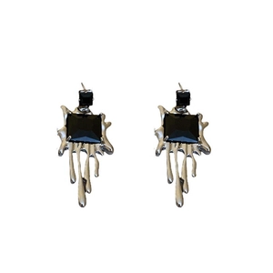 Dark liquid metal bow earrings with black square crystal in a minimalist punk design
