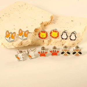 Minimalist animal stud earrings set featuring cute enamel rabbit, lion, and penguin designs