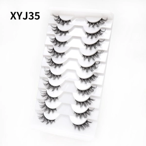 Macro shot of 10 pairs of black cat-eye half eyelashes model XYJ35 on a white tray