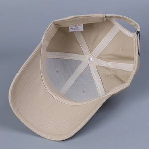 Detail view of cotton baseball cap interior with sweatband and adjustable metal buckle