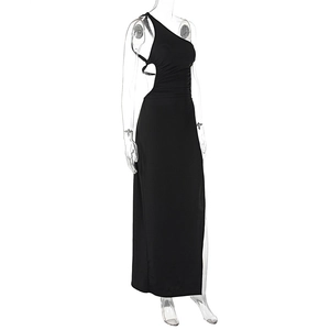 Detail view of black one-shoulder dress featuring side cutout and high leg slit design