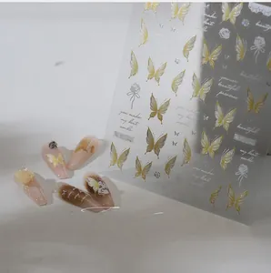 Detail of M-885 nail art stickers featuring yellow butterflies and rose floral designs