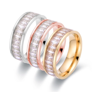Three titanium steel rings in silver, rose gold, and gold finish with rectangular zircons