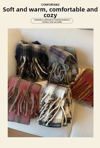 Close-up of thick plaid cashmere-like scarves with soft fringed edges in various colors