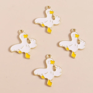 Set of 4 cartoon white duck charms in gold alloy with yellow enamel for DIY jewelry making