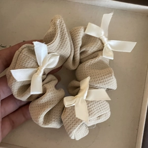 Beige ruffled scrunchie with white satin bows featuring a sweet Korean style design