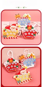 Detailed view of three Christmas theme electronic pop-it toys with hooks and LED buttons