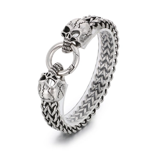 Vintage silver skull bracelet for men in gothic style with woven stainless steel chain