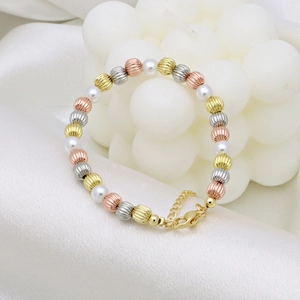 Three-tone striped metal beads and white pearls bracelet with a gold lobster clasp