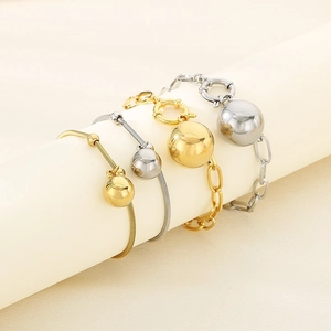 Poliertes Edelstahl-Schlangenarmband mit Kugelanhänger in Gold- und Silberoptik