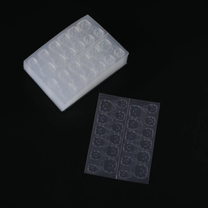 Macro view of clear silicone molds with precision slots for keyboard keycap DIY crafting