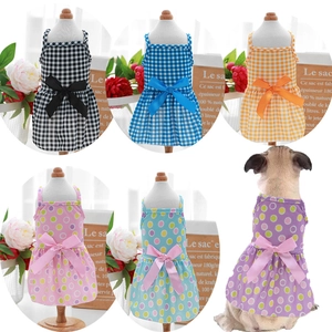 Summer pet princess dresses in plaid and polka dot patterns with bow tie accents