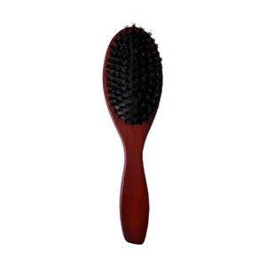 Brown lotus wood hairbrush with natural boar bristles on a clean white background