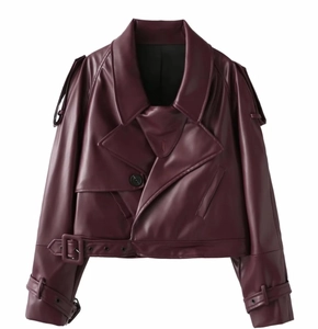 Detail view of burgundy PU leather biker jacket featuring lapels and metallic zipper texture