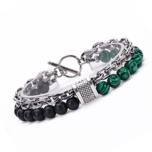 Detailed close-up of double-layer bracelet with volcanic stones and stainless steel T-bar clasp