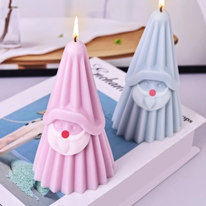 Gnome shaped scented candle in pink and blue for Christmas DIY gift decorations