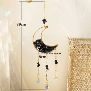 Detail view of 39cm moon suncatcher with black natural stones and crystal prisms