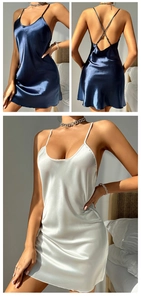 Detail of silk satin nightdress showing thin straps and cross back design in two colors