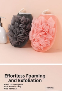 Close-up of dual-sided shower sponge set with exfoliating mesh and soft pink gray texture