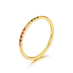 Minimalist gold titanium steel ring featuring a vibrant rainbow pave diamond band