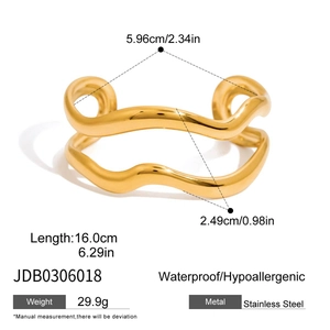 Detailed view of golden stainless steel wavy open bangle with 16cm size measurement