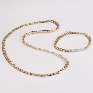 Detail of two-tone gold and silver 7mm NK chain set with a polished engravable plate