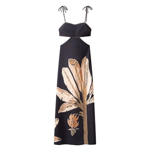 Black Hawaiian maxi dress with gold tropical palm prints and sexy waist cut-out detail