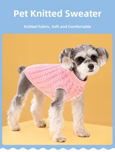 Close-up of pink cable knit dog sweater showing detailed texture and ribbed cuffs