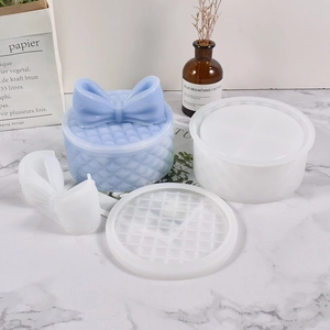 Detail view of round jewelry box silicone mold kit with bow lid and diamond pattern