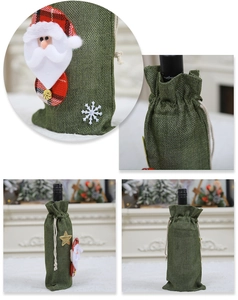 Detail of green burlap Christmas wine bottle cover with Santa Claus and snowflake design