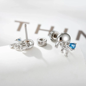 Blue zircon jellyfish stud earrings in silver minimalist ocean style for women