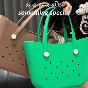 Detail view of large EVA beach bag showing waterproof hole design and textured surface