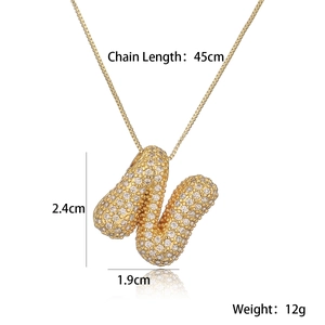 Detailed dimensions of gold letter N pendant necklace with iced-out crystals and measurements