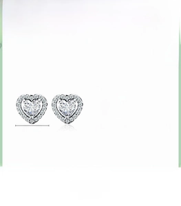 Detailed view of 925 silver heart stud earrings with cubic zirconia and 0.72cm dimension